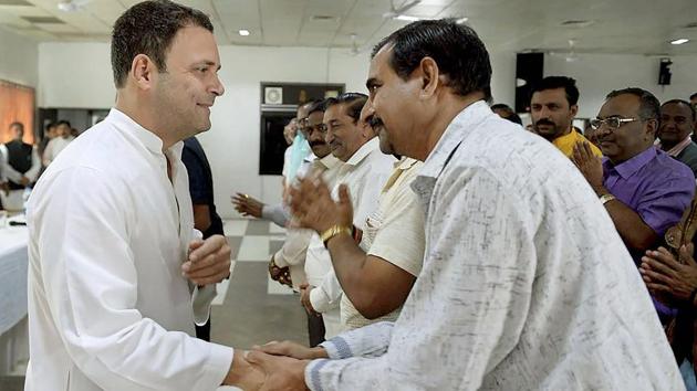 Congress vice-president Rahul Gandhi meets a delegation of traders’ representatives in Amreli, Gujarat, on Thursday. (PTI Photo) Congress vice-president Rahul Gandhi meets a delegation of traders’ representatives in Amreli, Gujarat, on Thursday. (PTI Photo)