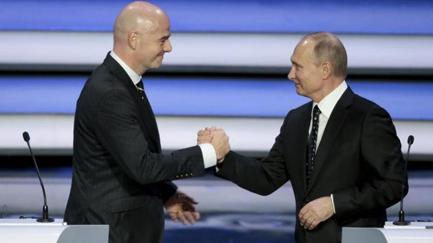 FIFA president Gianni Infantino, left, and Russian President Vladimir Putin shakes hands. (AP) FIFA president Gianni Infantino, left, and Russian President Vladimir Putin shakes hands. (AP)