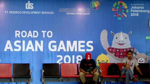 This picture taken on November 28, 2017 shows a signboard for the Asian Games 2018 at the airport in Palembang, Indonesia. Half-finished venues and an air of unpreparedness raise an uncomfortable question for Indonesia.(AFP)