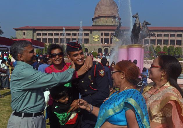 Cadets share a light moment with family members after the Passing Out Parade of the 133rd course of the National Defence Academy (NDA) in Pune on Thursday. (Pratham Gokhale/HT Photo) Cadets share a light moment with family members after the Passing Out Parade of the 133rd course of the National Defence Academy (NDA) in Pune on Thursday. (Pratham Gokhale/HT Photo)