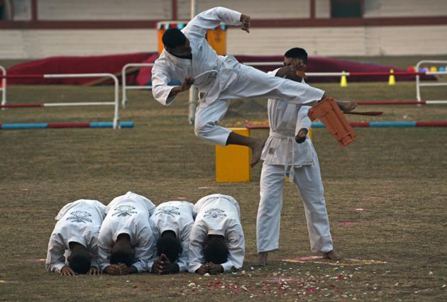 Cadets display their Karate skills during the PT and Equestrian Display of the 133rd NDA course at The National Defence Academy (NDA) in Pune on Wednesday. (Pratham Gokhale/HT Photo) Cadets display their Karate skills during the PT and Equestrian Display of the 133rd NDA course at The National Defence Academy (NDA) in Pune on Wednesday. (Pratham Gokhale/HT Photo)