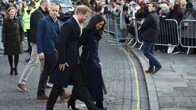 Britain's Prince Harry and his fiancee US actress Meghan Markle greet wellwishers on a walkabout as they arrive for an engagement at Nottingham Contemporary in Nottingham, central England, on December 1. (AFP Photo) Britain's Prince Harry and his fiancee US actress Meghan Markle greet wellwishers on a walkabout as they arrive for an engagement at Nottingham Contemporary in Nottingham, central England, on December 1. (AFP Photo)