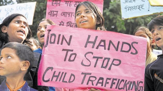 Children shouting Slogans against Child Trafficking on the occation of Global Day Against Child Trafficking at Jantar Mantar on Friday.(HT File Photo)