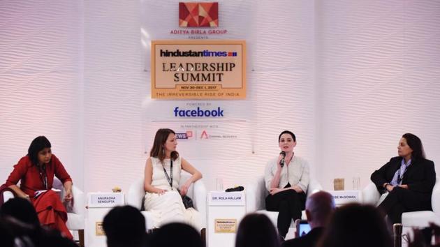 Rose McGowan (3rdL), actress, writer, director, music artist and activist with Farah Mohamed (R), Chief Executive Officer, Malala Fund and Dr. Rola Hallam (2ndL), CEO, CanDo in a discussion chaired by Anuradha Sengupta, Consulting Editor, CNN - NEWS 18 during the Hindustan Times Leadership Summit 2017 in New Delhi. (Burhaan Kinu / HT Photo)