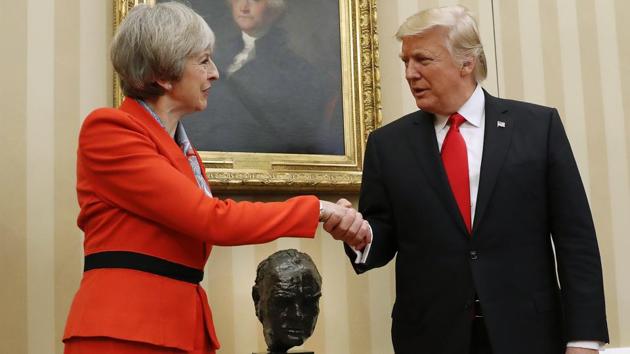 This is a Jan. 27, 2017 file photo of US President Donald Trump as he shakes hands with British Prime Minister Theresa May in the Oval Office of the White House in Washington. (AP) This is a Jan. 27, 2017 file photo of US President Donald Trump as he shakes hands with British Prime Minister Theresa May in the Oval Office of the White House in Washington. (AP)