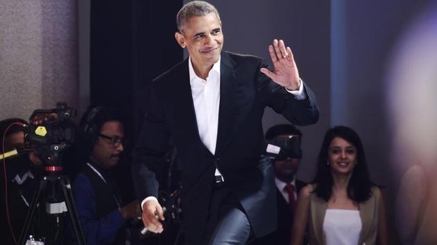 Former US president Barack Obama arrives the Hindustan Times Leadership Summit in New Delhi on Friday.(Burhaan Kinu/HT PHOTO)