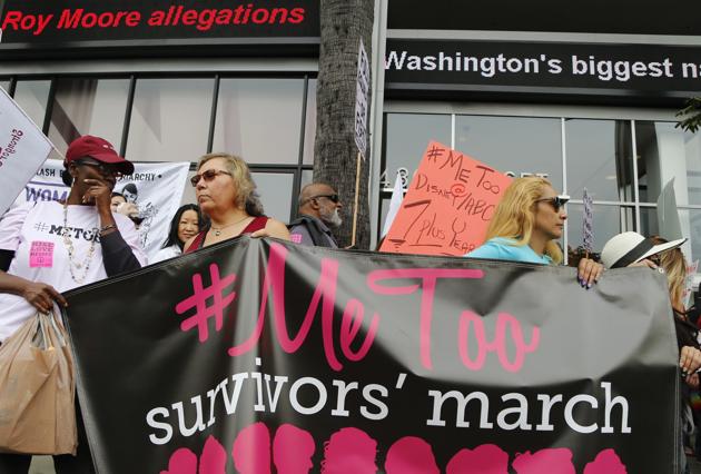 In this file photo, participants rally outside CNN's Hollywood studios on Sunset Boulevard to take a stand against sexual assault and harassment for the #MeToo March in the Hollywood district of Los Angeles. A spate of recent public revelations, including the spontaneous #metoo discussions on social media, is emboldening many victims of sexual harassment to speak up, but many still remain silent. (AP Photo/Damian Dovarganes, File) In this file photo, participants rally outside CNN's Hollywood studios on Sunset Boulevard to take a stand against sexual assault and harassment for the #MeToo March in the Hollywood district of Los Angeles. A spate of recent public revelations, including the spontaneous #metoo discussions on social media, is emboldening many victims of sexual harassment to speak up, but many still remain silent. (AP Photo/Damian Dovarganes, File)