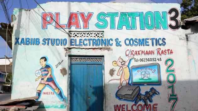 A mural on a shop front shows a PlayStation 3 in Hamarweyne district, Mogadishu, Somalia(REUTERS)