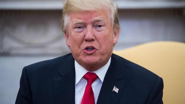 US President Donald Trump in the Oval Office at the White House in Washington, DC, on November 30, 2017. (AFP) US President Donald Trump in the Oval Office at the White House in Washington, DC, on November 30, 2017. (AFP)