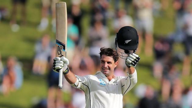 Colin de Grandhomme raises his bat after scoring a century in New Zealand’s 1st Test against West Indies on Saturday. (ICC/Twitter) Colin de Grandhomme raises his bat after scoring a century in New Zealand’s 1st Test against West Indies on Saturday. (ICC/Twitter)