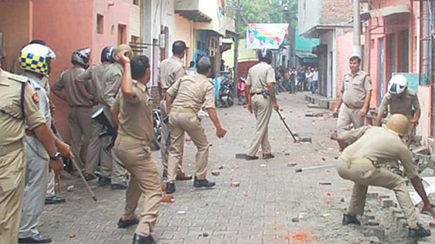 Members of two communities set fire to a few vehicles and a shop in the area. At least 12 people, including six policemen, were injured in the incident. (File) Members of two communities set fire to a few vehicles and a shop in the area. At least 12 people, including six policemen, were injured in the incident. (File)
