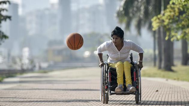 Nisha Gupta has won accolades for the country at the International Wheelchair Basketball Championship in July. In May 2004, Gupta sustained severe injuries to the head and spinal cord after she fell down while plucking mangoes. However, by December 2015, she won the bronze medal at the National Wheelchair Basketball championship and earlier this year was recognized as one of the top five most promising female players at the international competition in Bali. (Kunal Patil / HT Photo) 