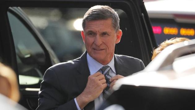 Former US National Security Adviser Michael Flynn arrives for a plea hearing at US District Court, where he’s expected to plead guilty to lying to the FBI about his contacts with Russia's ambassador to the United States, in Washington, December 1, 2017. (REUTERS) Former US National Security Adviser Michael Flynn arrives for a plea hearing at US District Court, where he’s expected to plead guilty to lying to the FBI about his contacts with Russia's ambassador to the United States, in Washington, December 1, 2017. (REUTERS)