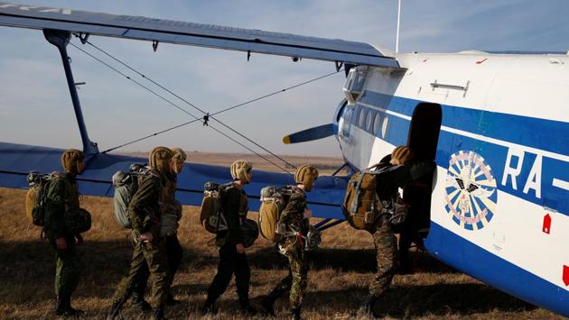 Students from the General Yermolov Cadet School board an airplane for a parachute jump at an airdrome in the village of Novomaryevskaya outside Stavropol. Physical exercises go hand-in-hand with weapons training, marksmanship tests, car driving and even parachuting. (Eduard Korniyenko / REUTERS) Students from the General Yermolov Cadet School board an airplane for a parachute jump at an airdrome in the village of Novomaryevskaya outside Stavropol. Physical exercises go hand-in-hand with weapons training, marksmanship tests, car driving and even parachuting. (Eduard Korniyenko / REUTERS)