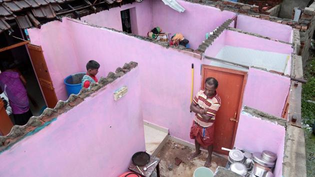A damaged house with its roof blown away following storm winds at Nagercoil in Kanyakumari.  Kerala Chief Minister Pinarayi Vijayan Quoting meteorological reports, has said that it was a major relief that the cyclonic winds that were 70 km from the Kerala coastline on Thursday, are now around 200 km away. (PTI) 