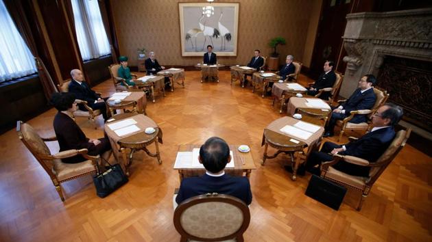 Japan's Prime Minister Shinzo Abe (Top, C), attends a meeting of the Imperial Household Council to discuss the timeline for the abdication of Japan's Emperor Akihito at the Imperial Household Agency on December 1, 2017 in Tokyo, Japan. (Toru Hanai / AFP)