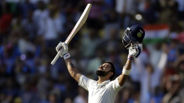 Indian captain Virat Kohli looks skywards as he celebrates scoring a double century during the third day of the second test cricket match against Sri Lanka in Nagpur, India on November 26, 2017. (Rajanish Kakade / AP)