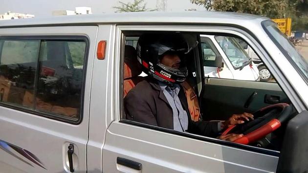 Wearing a helmet in a sale car