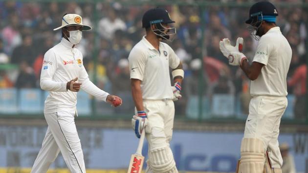 Sri Lanka cricket team captain Dinesh Chandimal (L) wears a mask in an attempt to protect himself. (AFP) Sri Lanka cricket team captain Dinesh Chandimal (L) wears a mask in an attempt to protect himself. (AFP)