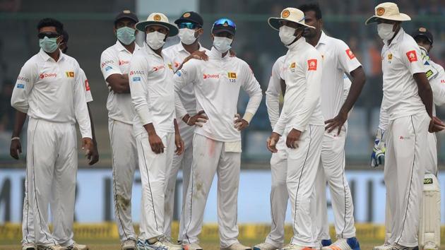 Sri Lanka cricket players wear masks in an attempt to protect themselves from air pollution on Day 2 of Delhi Test. (AFP)