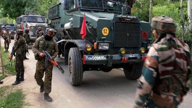Army cordon off the area near the house where militants were hiding during an encounter at Bamnoo in Pulwama district of south Kashmir. (PTI File Photo) Army cordon off the area near the house where militants were hiding during an encounter at Bamnoo in Pulwama district of south Kashmir. (PTI File Photo)