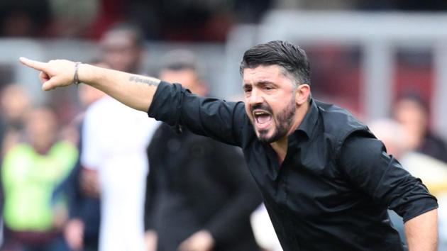 AC Milan's manager Gennaro Gattuso reacts during the Italian Serie A football match against Benevento Calcio on Sunday (AFP) AC Milan's manager Gennaro Gattuso reacts during the Italian Serie A football match against Benevento Calcio on Sunday (AFP)