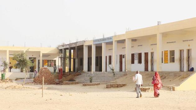 Far from being getting worn out, students of the Shahid Balwant Singh Government Model Senior Secondary School in Ujoli village are actually thriving under the no-break schedule, redefining the popular English adage. (Himanshu Vyas / HT Photo)