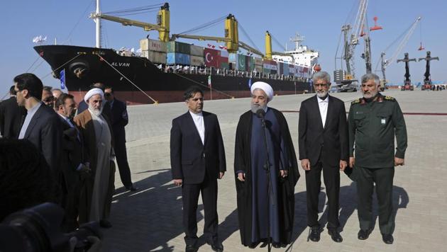 Iranian President Hassan Rouhani, center, speaks during the inauguration of a newly-built extension of the port of Chabahar, near the Pakistani border, on the Gulf of Oman, in Iran, on Sunday.(AP Photo) Iranian President Hassan Rouhani, center, speaks during the inauguration of a newly-built extension of the port of Chabahar, near the Pakistani border, on the Gulf of Oman, in Iran, on Sunday.(AP Photo)