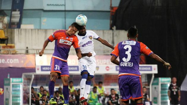 Chennaiyin FC and FC Pune City players vie for the ball. (ISL / SPORTZPICS) Chennaiyin FC and FC Pune City players vie for the ball. (ISL / SPORTZPICS)