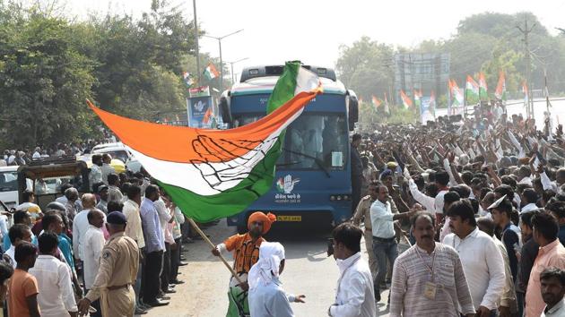 Congress supporter waves a party flag at Prantij town, 65 km from Ahmedabad. (AFP file) Congress supporter waves a party flag at Prantij town, 65 km from Ahmedabad. (AFP file)