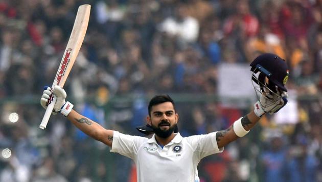 Virat Kohli celebrates his double century against Sri Lanka during the second day of the third cricket Test match at Feroz Shah Kotla in New Delhi on Sunday. (PTI) Virat Kohli celebrates his double century against Sri Lanka during the second day of the third cricket Test match at Feroz Shah Kotla in New Delhi on Sunday. (PTI)