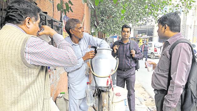 Sooraj Bhan sells homemade buttermilk near the central Delhi office towers on Barakhamba Lane. (Mayank Austen Soofi / HT Photo) Sooraj Bhan sells homemade buttermilk near the central Delhi office towers on Barakhamba Lane. (Mayank Austen Soofi / HT Photo)