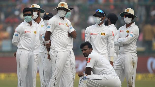 Pollution in New Delhi temporarily held up play during the 3rd Test between India and Sri Lanka in New Delhi on Sunday.(AFP)
