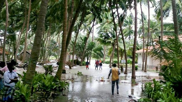 A view of a flooded locality following Cyclone Ockhi in Lakshadweep on Sunday. Leaving behind a trail of destruction in Tamil Nadu, Kerala and Lakshadweep, cyclone Ockhi is now over the Arabian Sea around 690km south-southwest of Mumbai and 870km south-southwest of Gujarat’s Surat, the India Meteorological Department (IMD) said on Monday. (PTI) A view of a flooded locality following Cyclone Ockhi in Lakshadweep on Sunday. Leaving behind a trail of destruction in Tamil Nadu, Kerala and Lakshadweep, cyclone Ockhi is now over the Arabian Sea around 690km south-southwest of Mumbai and 870km south-southwest of Gujarat’s Surat, the India Meteorological Department (IMD) said on Monday. (PTI)