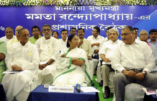 West Bengal Chief Minister Mamata Banerjee in conversation with Chief Secretary Basudeb Bandopadhay (R) at the first administrative review meeting of her government in Kolkata on June 3, 2016. (Subhendu Ghosh/ HT file photo) West Bengal Chief Minister Mamata Banerjee in conversation with Chief Secretary Basudeb Bandopadhay (R) at the first administrative review meeting of her government in Kolkata on June 3, 2016. (Subhendu Ghosh/ HT file photo)