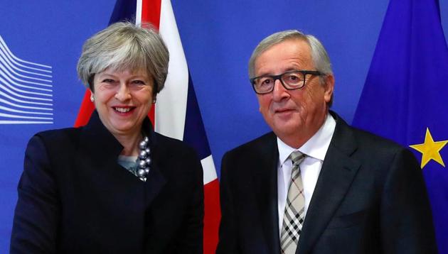 Britain's Prime Minister Theresa May with European Commission President Jean-Claude Juncker in Brussels on December 4, 2017. (Reuters) Britain's Prime Minister Theresa May with European Commission President Jean-Claude Juncker in Brussels on December 4, 2017. (Reuters)