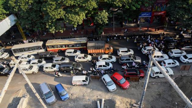 Pune, India - Nov. 29, 2017: Heavy traffic congestion causing because of the beautifications construction work on JM road in Pune, India, on Wednesday, November 29, 2017. (Photo by Sanket Wankhade/HT PHOTO)