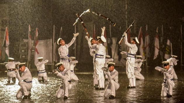 Navy personnel display their skills during the celebrations in Mumbai. (Kunal Patil/HT PHOTO) 