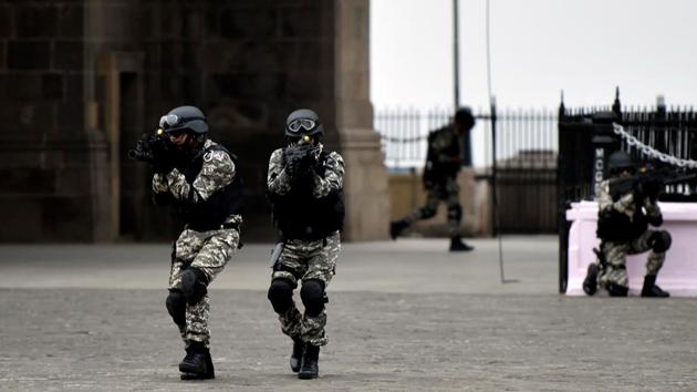 Here, Navy personnel perform a simulated attack and hostage rescue operation at Gateway of India. (Kunal Patil/HT) 