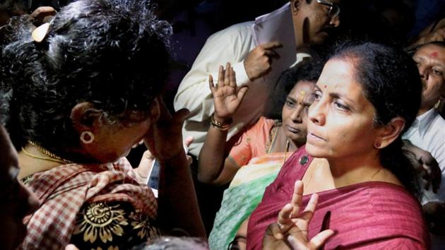Union Minister for Defence, Nirmala Sitharaman met with people affected by Cyclone Ockhi in the flood-hit Kanyakumari district on Sunday. Sitharaman said today that representatives of fishermen will also be included in the ongoing search operations in Kerala, adding that warships had been deployed for the rescue operation which is “more intense” than the one during the 2004 tsunami. (PTI) Union Minister for Defence, Nirmala Sitharaman met with people affected by Cyclone Ockhi in the flood-hit Kanyakumari district on Sunday. Sitharaman said today that representatives of fishermen will also be included in the ongoing search operations in Kerala, adding that warships had been deployed for the rescue operation which is “more intense” than the one during the 2004 tsunami. (PTI)