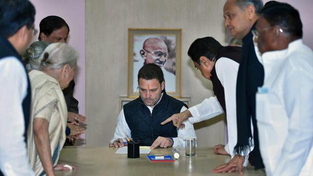 Congress vice president Rahul Gandhi with party leaders during the filing of his nomination papers for the post of party president, at the AICC office in New Delhi on Monday.(PTI)