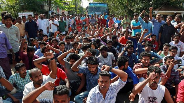 Residents block a road during a protest demanding the reconstruction of damaged sea walls and rehabilitation for those living by the seashore from the government after flooding caused by Cyclone Ockhi, in the coastal village of Chellanam, Kerala on December 3, 2017. The death toll climbed to 28 in Kerala after a rescue team recovered two more bodies on Monday and officials said at least 90 people were still missing in the state. (Sivaram V / REUTERS) Residents block a road during a protest demanding the reconstruction of damaged sea walls and rehabilitation for those living by the seashore from the government after flooding caused by Cyclone Ockhi, in the coastal village of Chellanam, Kerala on December 3, 2017. The death toll climbed to 28 in Kerala after a rescue team recovered two more bodies on Monday and officials said at least 90 people were still missing in the state. (Sivaram V / REUTERS)