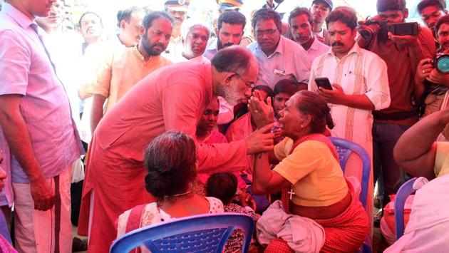 Union Minister of State for Electronics and Information Technology, Alphons Joseph met with the relatives of missing fishermen at Poonthura Coast in Thiruvananthapuram, Kerala, India on December 03, 2017. On Sunday, families of the fishermen blocked roads at several places and defied warnings by the met office and government, venturing out to look for them. (Vivek Nair / HT Photo) Union Minister of State for Electronics and Information Technology, Alphons Joseph met with the relatives of missing fishermen at Poonthura Coast in Thiruvananthapuram, Kerala, India on December 03, 2017. On Sunday, families of the fishermen blocked roads at several places and defied warnings by the met office and government, venturing out to look for them. (Vivek Nair / HT Photo)