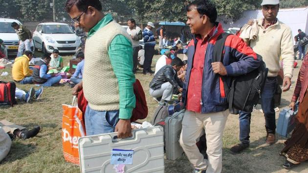 Polling officials with election voting machines in Ghaziabad on November 25, 2017 on the eve of second phase of the Uttar Pradesh civic body elections. (PTI) Polling officials with election voting machines in Ghaziabad on November 25, 2017 on the eve of second phase of the Uttar Pradesh civic body elections. (PTI)