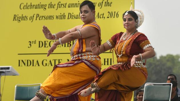 Dancers Mithilesh Patnaik and Shakti Swarupavil who has a speech impairment perform to celebrate World Disability Day in Delhi. (Sushil Kumar/HT PHOTO)