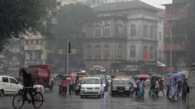 Rain near Chhatrapati Shivaji Maharaj Terminus. (Kunal Patil/HT)