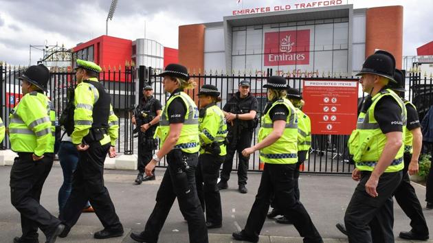 Armed police officers patrol outside the Old Trafford Cricket Ground ahead of the One Love Manchester tribute concert in Manchester on June 4, 2017. (AFP File Photo) Armed police officers patrol outside the Old Trafford Cricket Ground ahead of the One Love Manchester tribute concert in Manchester on June 4, 2017. (AFP File Photo)