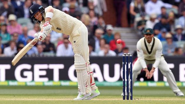 England's batsman Joe Root steers a ball away from the Australia attack on the fourth day of the second Ashes cricket Test match in Adelaide on Tuesday. (AFP) England's batsman Joe Root steers a ball away from the Australia attack on the fourth day of the second Ashes cricket Test match in Adelaide on Tuesday. (AFP)