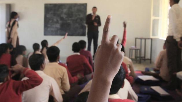 Students attend a class at a government school , in Ujholi , Kot Kasim, of District Alwar , Rajasthan, on November 30, 2017. (HT Photo) Students attend a class at a government school , in Ujholi , Kot Kasim, of District Alwar , Rajasthan, on November 30, 2017. (HT Photo)