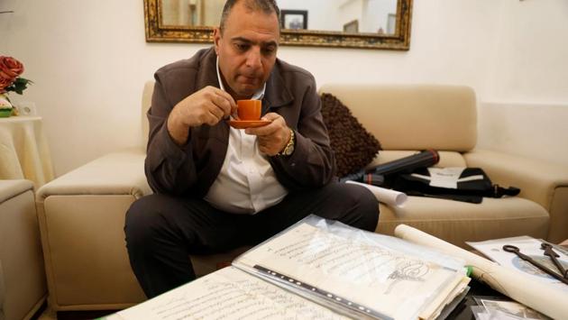 Another of the city’s oldest Muslim families, the Nusseibehs, were entrusted with the duty of opening and closing the church doors, a task they perform to this day. It requires firm fingers: The key is 30 cm (12 inches) long and weighs 250 grams (0.5 pounds). Joudeh says his key is about 800 years old. Another copy he holds broke after centuries of use. (Ronen Zvulun / REUTERS) Another of the city’s oldest Muslim families, the Nusseibehs, were entrusted with the duty of opening and closing the church doors, a task they perform to this day. It requires firm fingers: The key is 30 cm (12 inches) long and weighs 250 grams (0.5 pounds). Joudeh says his key is about 800 years old. Another copy he holds broke after centuries of use. (Ronen Zvulun / REUTERS)